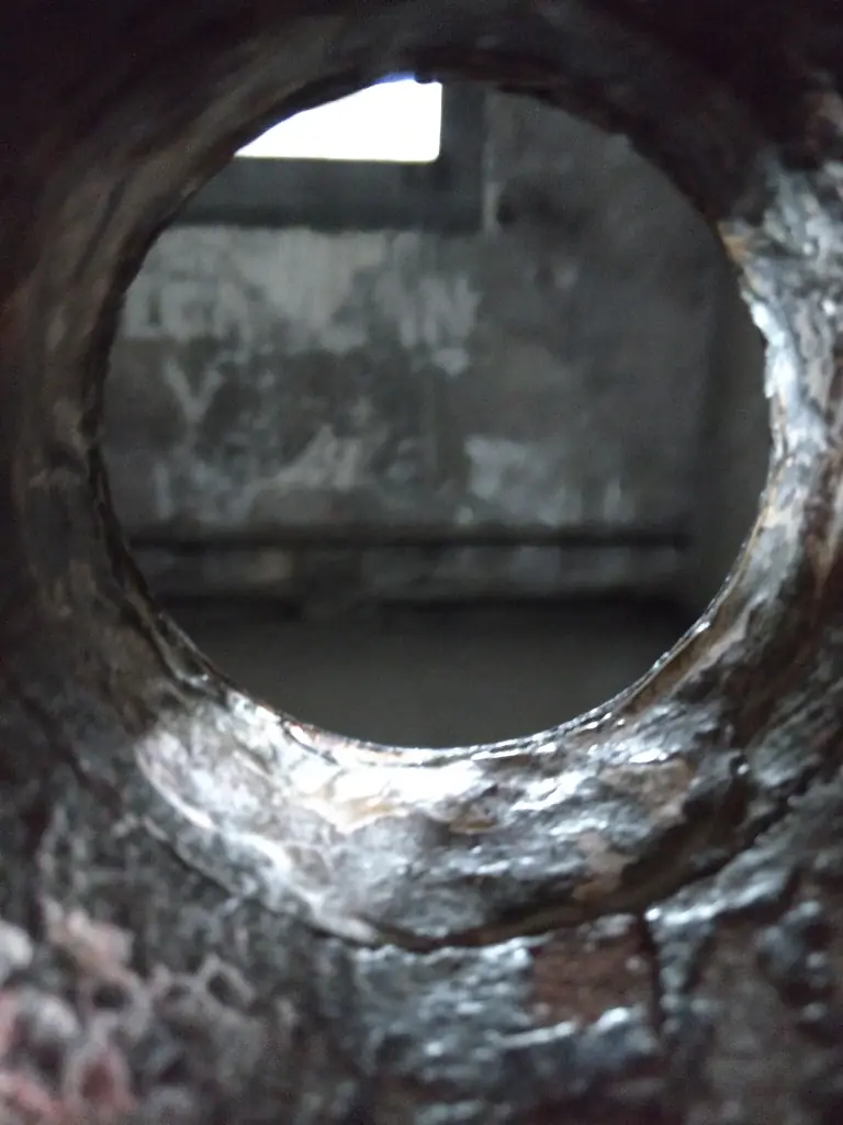 Old cell door peep hole Old cell door peep hole